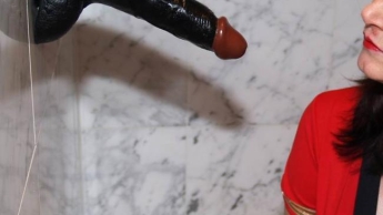 I suck a big black Dildo in the bathroom